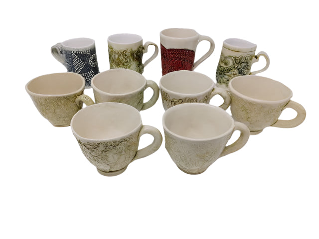 Hand built Mugs