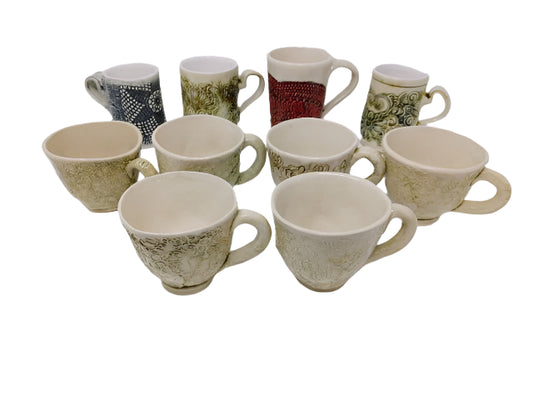 Hand built Mugs