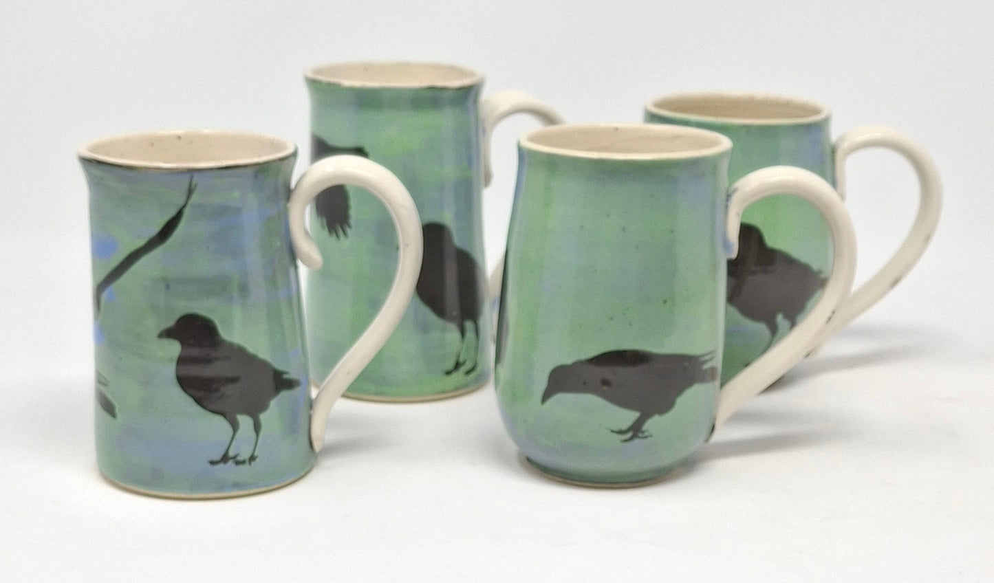 Crow Coffee Mugs - Blue/Green