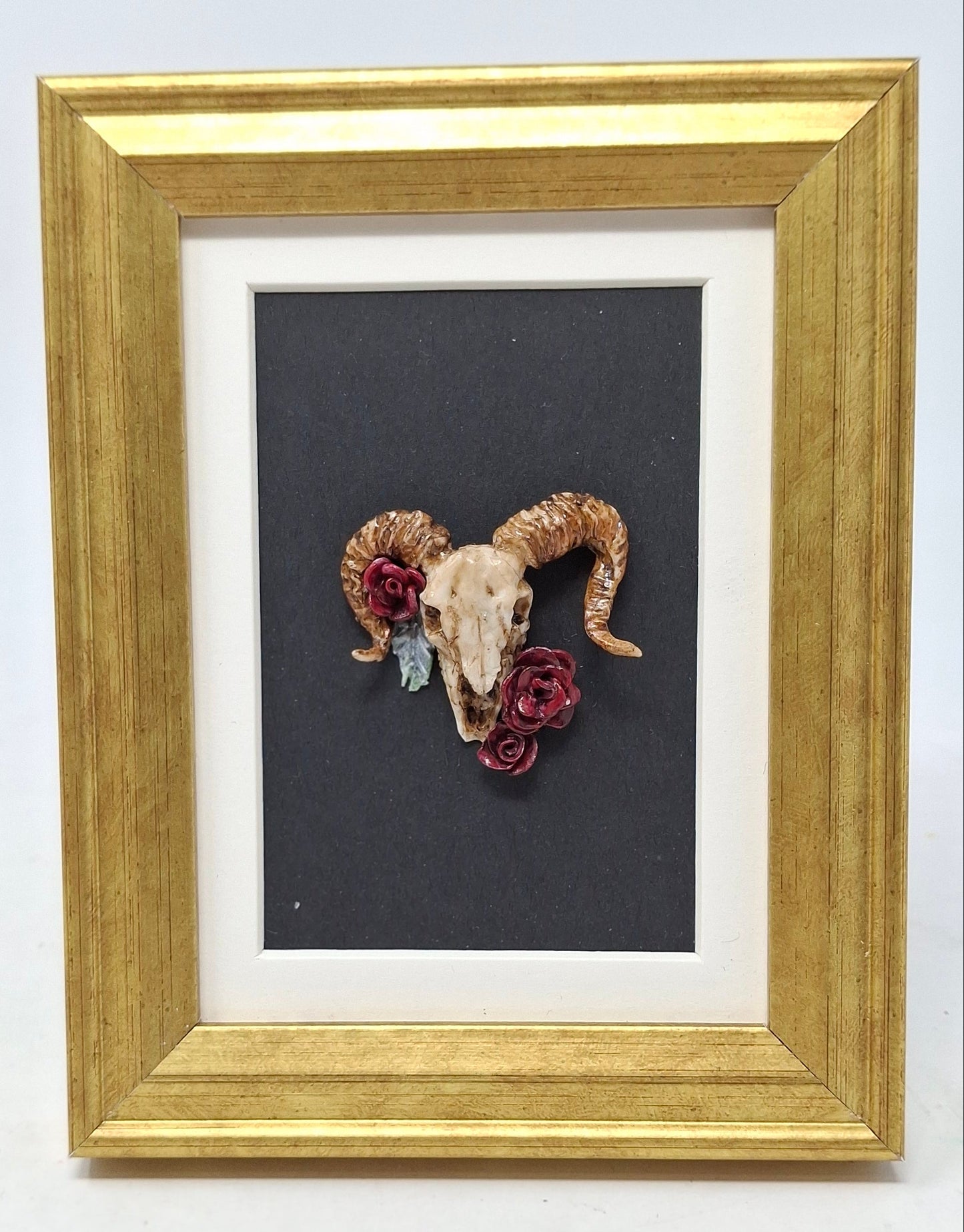 Framed Skulls with Flowers